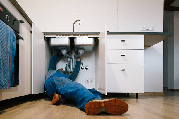 Professional Drain Cleaning technician working in Bloomfield, MO